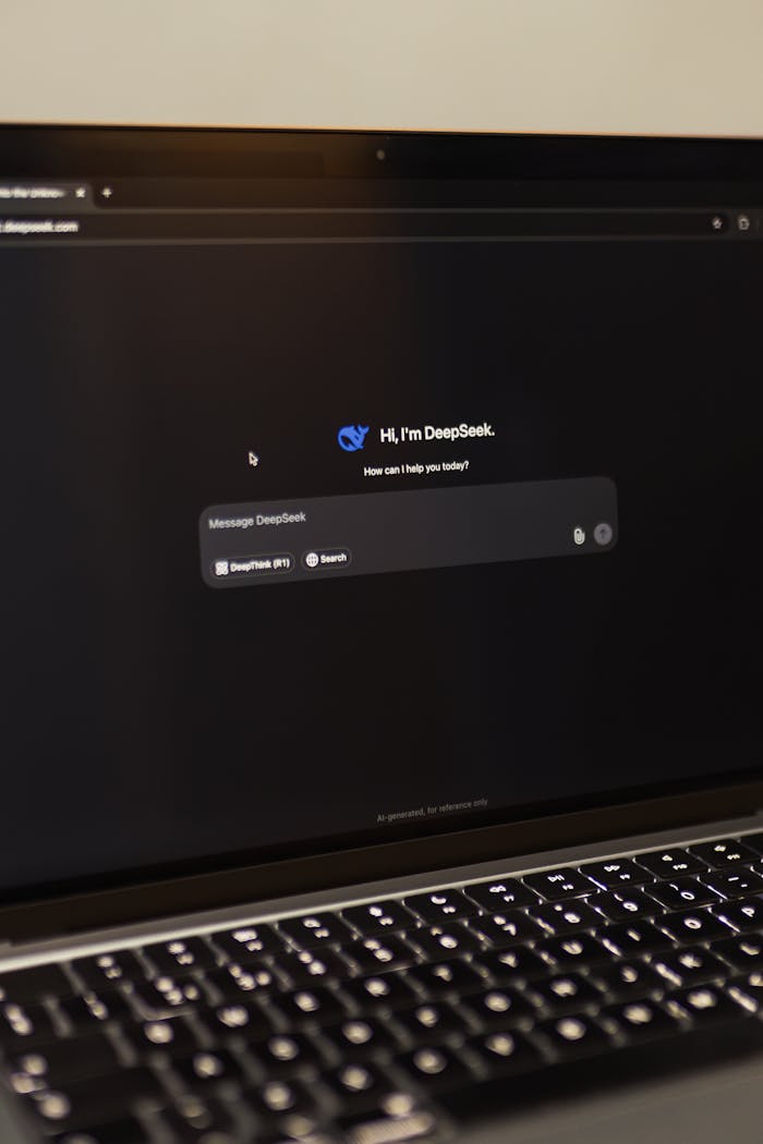 vision Image of a laptop showing an interactive AI interface with DeepSeek application.